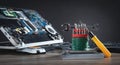 Broken laptop with a wrench and screwdriver on the table. Computer repair service Royalty Free Stock Photo