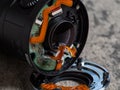 Broken lens off a camera showing printed circuit board and electronics Royalty Free Stock Photo