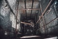 Broken Lift or elevator shaft or well in abandoned industrial ruined factory Royalty Free Stock Photo