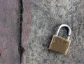 Broken Lock on concrete vintage wall background Royalty Free Stock Photo