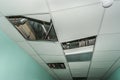 Broken metal rails of a modern false ceiling in the old building Royalty Free Stock Photo