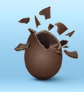 Broken milk chocolate egg on light blue background Royalty Free Stock Photo