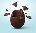 Broken milk chocolate egg on light blue background Royalty Free Stock Photo