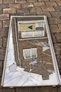 Broken mirror lying shattered on the ground Royalty Free Stock Photo