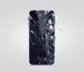 Broken mobile phone screen, scattered shards. Smartphone display crashed and scratched. Royalty Free Stock Photo