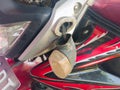 Broken motorcycle turn signal because it was hit by another vehicle Royalty Free Stock Photo