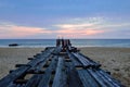 Broken old wooden pier bridge into the sea Royalty Free Stock Photo