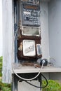 Broken pay phone handset and coin return Royalty Free Stock Photo