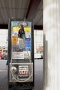 A broken pay phone near a train station Royalty Free Stock Photo