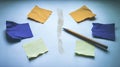 Broken Pencil Rests Beside Unfinished Notes on a Cluttered Table Royalty Free Stock Photo