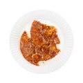 Broken pepperoni pizza on plate Royalty Free Stock Photo