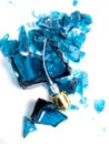 Broken perfume  bottle on white Royalty Free Stock Photo