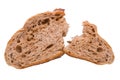 Broken piece of dark rye whole grain wholesome bread isolated on white background. Royalty Free Stock Photo