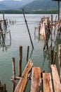 Broken pier of wooden planks in the Thai fishing village. Nature. Royalty Free Stock Photo