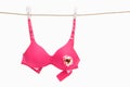 Broken pink bra for breast cancer concept