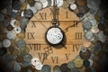 Broken Pocket Watch with Old Coins Royalty Free Stock Photo