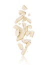 Broken porous white chocolate fall down on white background