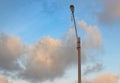 Broken public street lamp against cloudy and blue skies in Cilacap Indonesia 4 september 20