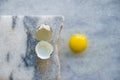 Broken quail egg with shell on white background Royalty Free Stock Photo