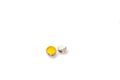 Broken quail egg in shell on a white background Royalty Free Stock Photo