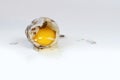 Broken quail egg on  white background Royalty Free Stock Photo