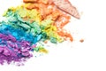 A broken rainbow colored eye shadow smear, make up palette isolated on a white background. Royalty Free Stock Photo