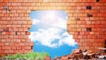 Broken red  brick wall with a big hole in the middle Royalty Free Stock Photo