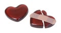 Broken Red Glass Heart Mended with a Bandage Royalty Free Stock Photo