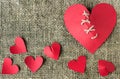 A broken red heart. Sewn thread. The concept of divorce. Royalty Free Stock Photo