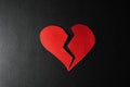 Broken red paper heart cracked split down the middle Royalty Free Stock Photo