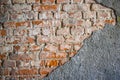Brick wall under spalled concrete Royalty Free Stock Photo
