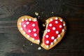 Broken red and white heart shaped royal icing cookie Royalty Free Stock Photo