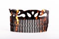 Broken retro plastic comb on a light background Royalty Free Stock Photo