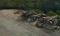 Broken road along the hillside trees and greenery Royalty Free Stock Photo