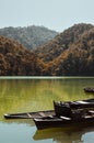 Broken Row Boats in a Mountain Lake