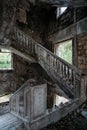 Broken ruined old staircase at abandoned house