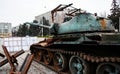 A broken Russian tank and anti-tank hedgehogs. Kremenchuk, Ukraine. Remains of military equipment