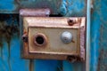 The broken and rusting steel door lock was on the top floor of the building Royalty Free Stock Photo