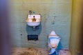 Broken rusty and dirty sink and toilet bowl from a cell at Alcatraz Prison San Francisco California USA Royalty Free Stock Photo