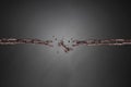 Broken rusty iron chain isolated on gray Royalty Free Stock Photo