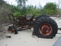 Broken rusty tractor on the beach in Poda Island in Thailand