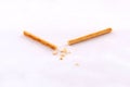 Broken salty bread stick isolated Royalty Free Stock Photo