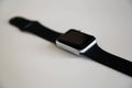 Broken Series 3 Apple Watch on a White Table Surface