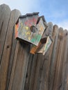 Broken shattered bird house Royalty Free Stock Photo