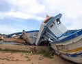 Broken shipwrecks after the disembarkation of refugees Royalty Free Stock Photo
