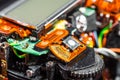 Broken shutter button in a disassembled camera close-up Royalty Free Stock Photo