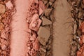 Broken and smashed make-up eyeshadow pallete, lay of brush strokes, close-up for background, top view Royalty Free Stock Photo
