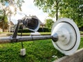 Broken street lamp with CCTV surveillance camera