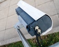 Broken street lamp with CCTV surveillance camera