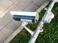 Broken street lamp with CCTV surveillance camera